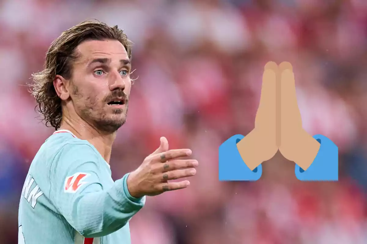 A soccer player in a light blue jersey gesturing with his hand, with a prayer hands emoji superimposed on the image.