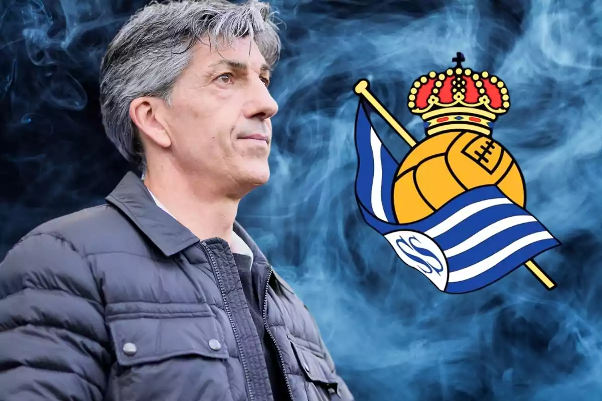 Gray-haired man in a black jacket in front of the Royal Society shield on a blue smoke background.