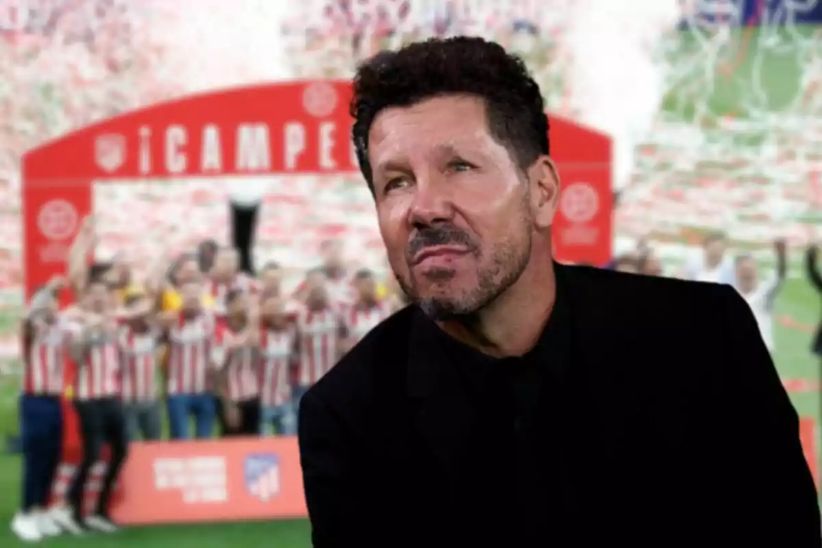 A bearded man with curly hair, dressed in black, with a football team celebration background with a red banner that says "CHAMPIONS!"