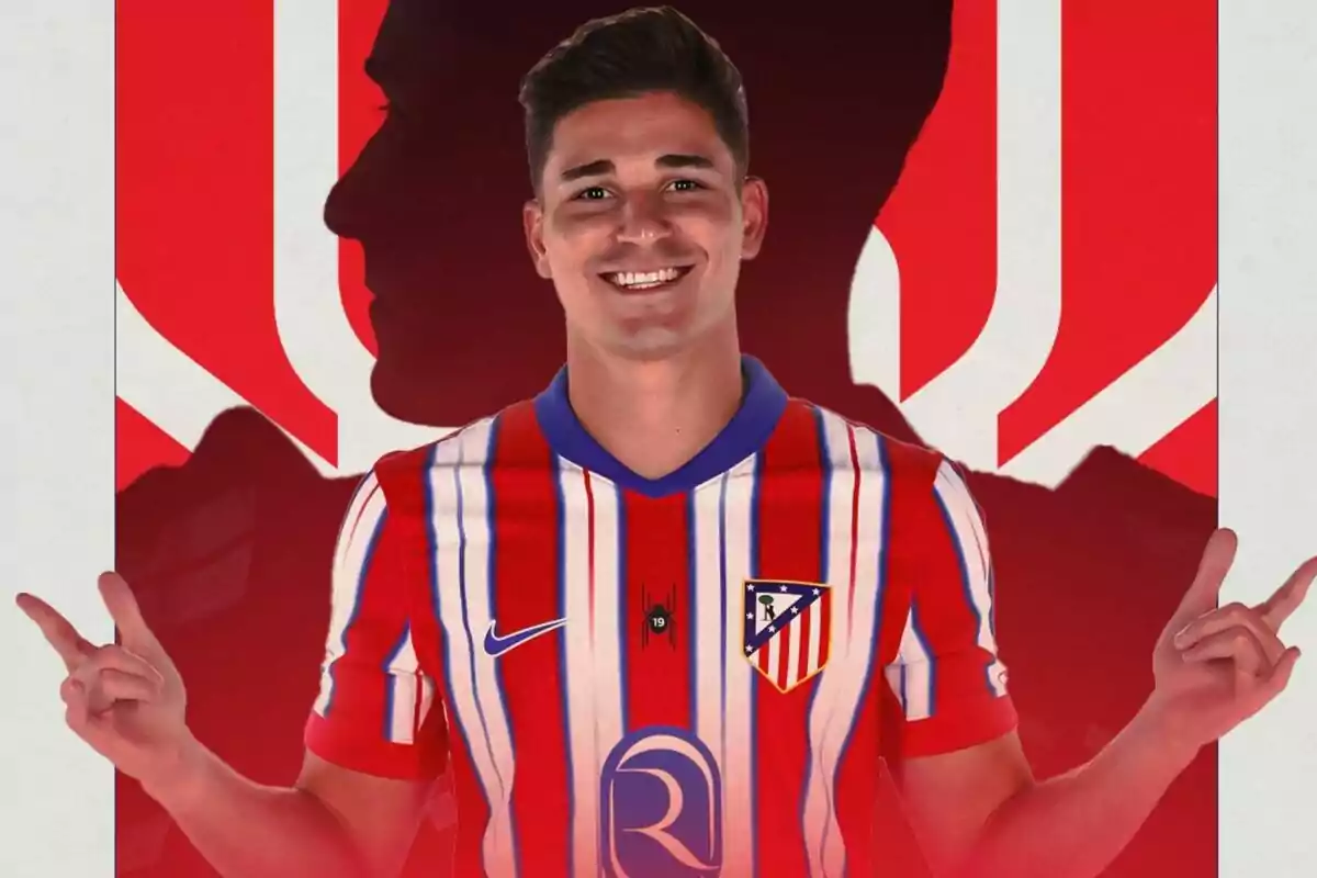 A smiling soccer player wearing an Atletico Madrid shirt against a red background.