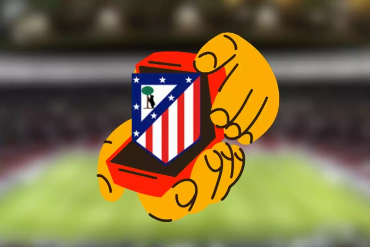 Hands holding a red box with the Atletico Madrid crest in a blurred football stadium.