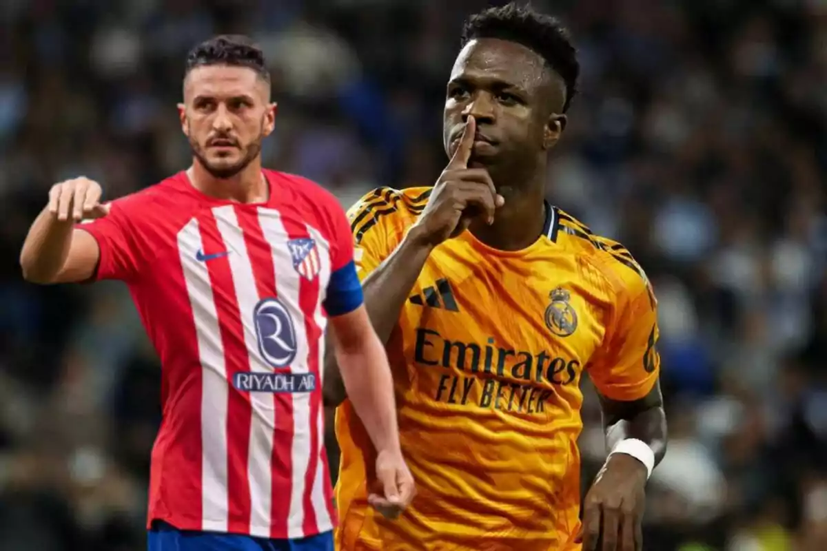 Two football players on the field, one wearing the Atlético de Madrid shirt and the other wearing the Real Madrid shirt.