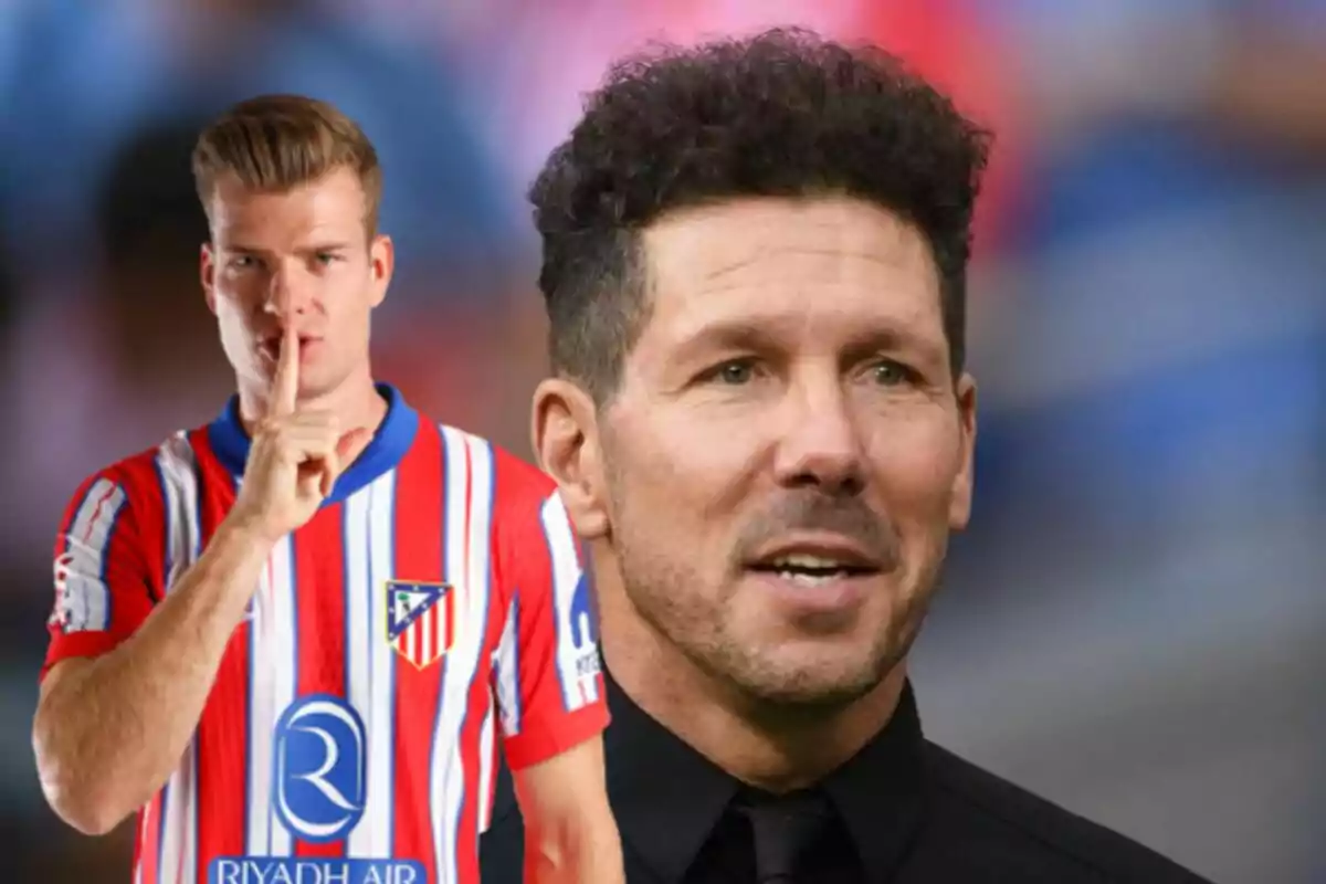 An Atlético de Madrid player makes a gesture of silence while a man in a black suit appears in the foreground.