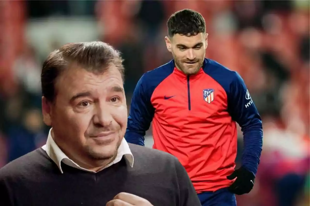 A man in a black sweater and white shirt in the foreground and a football player in an Atlético de Madrid training uniform in the background.