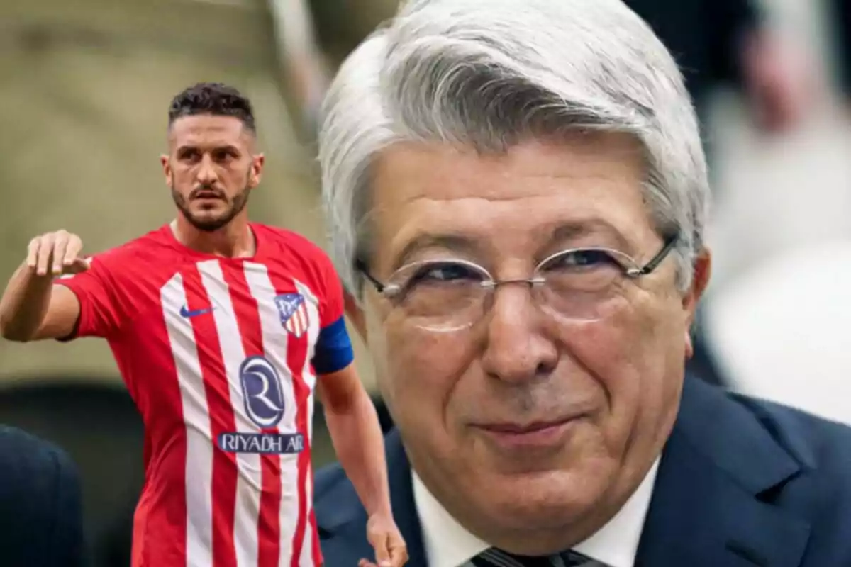 A football player wearing an Atlético de Madrid shirt next to an older man with glasses.