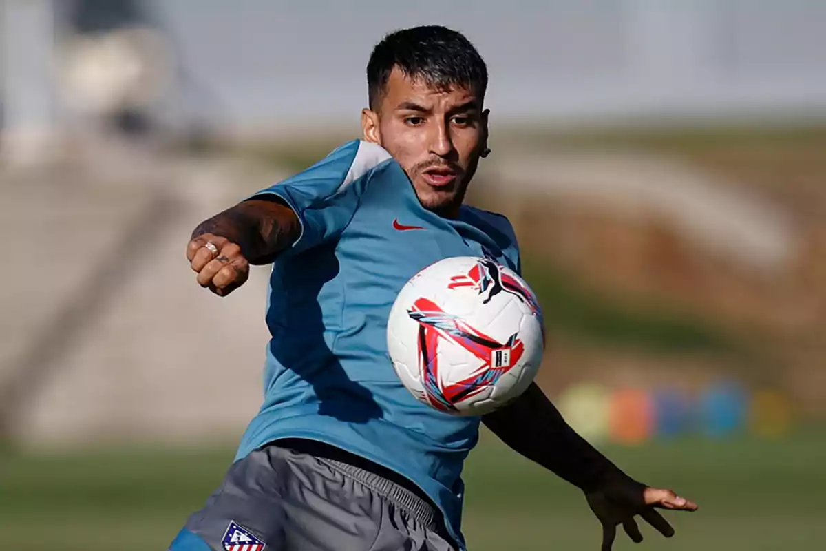 Soccer player controlling the ball during training.