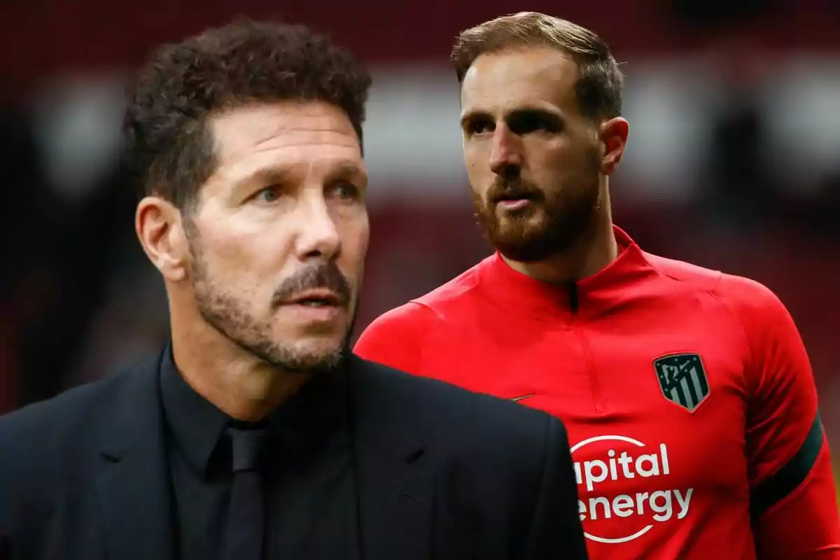 Two men, one in a black suit and the other in a red sports uniform, with the logo of a football team on the chest.