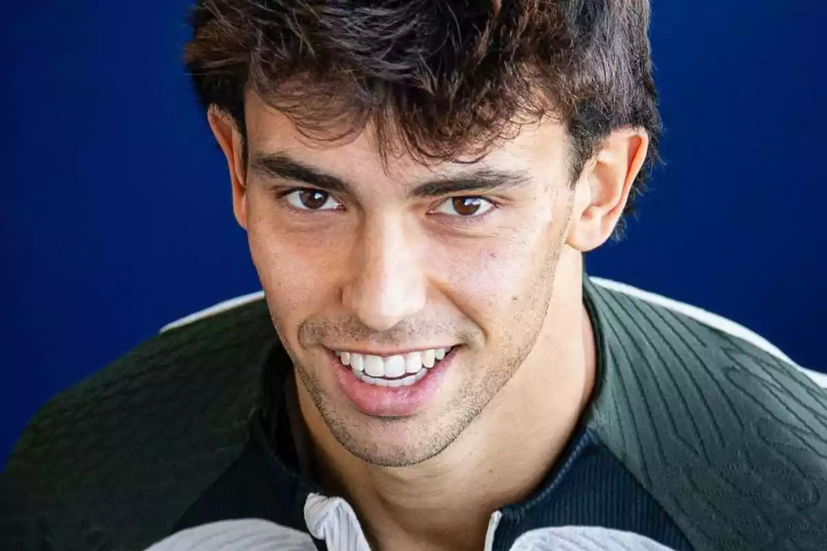 Joao Félix with a big smile looking at the camera