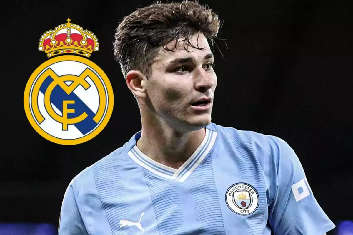 A soccer player wearing a Manchester City shirt and the Real Madrid shield in the background.