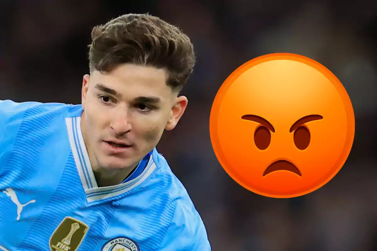 Soccer player in a blue jersey with an angry face emoji next to him.