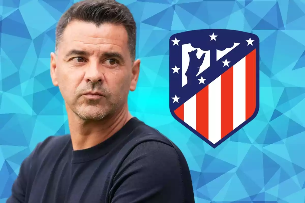 Man with a black sweater in front of a blue background with the Atlético de Madrid shield.