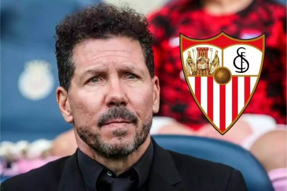 A man with a beard and curly hair sits, with the Sevilla FC crest superimposed on the right.