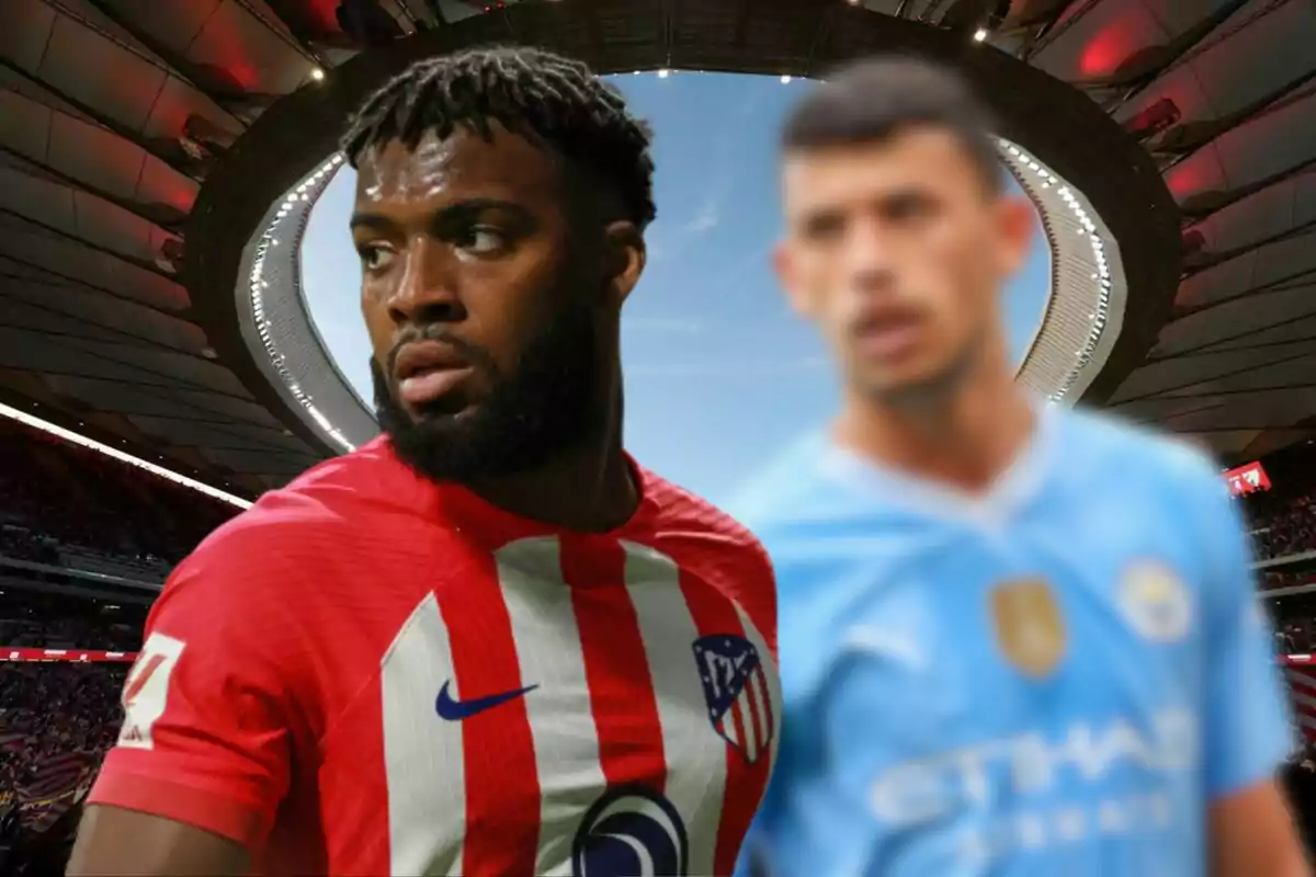 Two football players, one wearing an Atlético de Madrid shirt and the other wearing a Manchester City shirt, in a stadium.